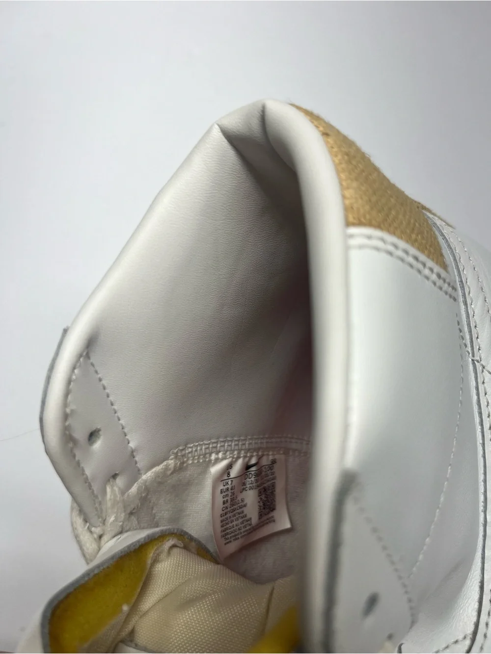 Nike Women’s White High-Top Sneakers with Tan Panels